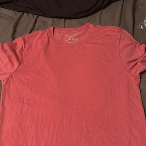 New salmon Lucky Brand Medium t shirt. Never been worn and the tag is still on.